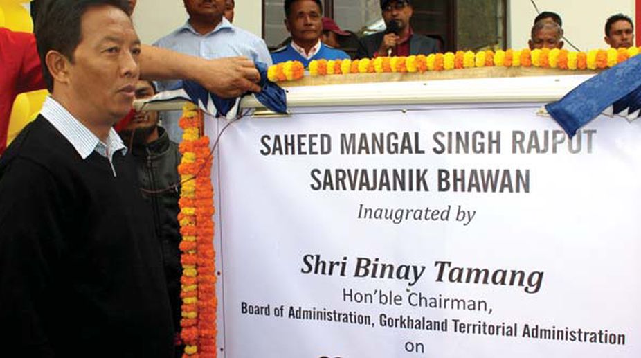 GTA board chairman Binoy Tamang unveils a community hall named after martyr Mangal Singh Rajput who immolated hilself on 30 July 2013 for the cause of Gorkhaland. Above Dr Grahams Homes farm in Kalimpong on Thursday. (Photo: SNS)