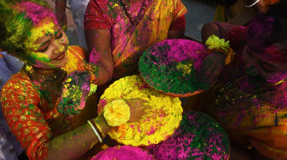 In pics: Colours, celebrations mark Holi festival in India