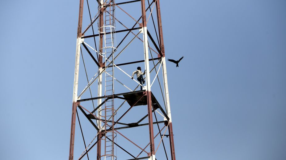 In pics: Man climbs tower in Connaught place, rescued