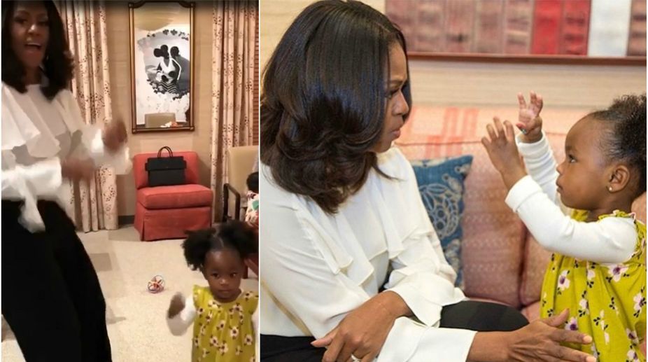 Girl in viral photo shakes leg with Michelle Obama