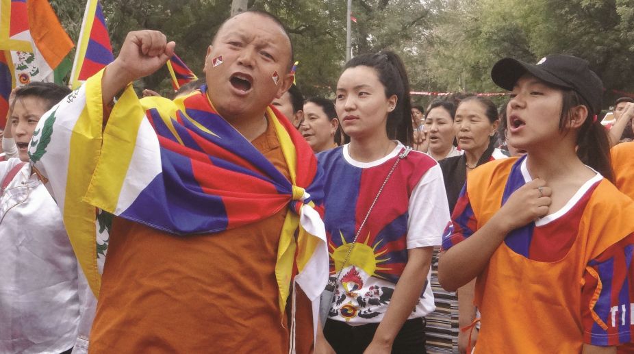 Tibetans mark anniversary of protests