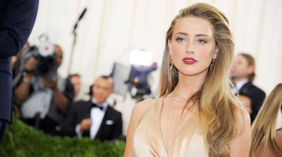 Amber Heard donates divorce settlement money to charity
