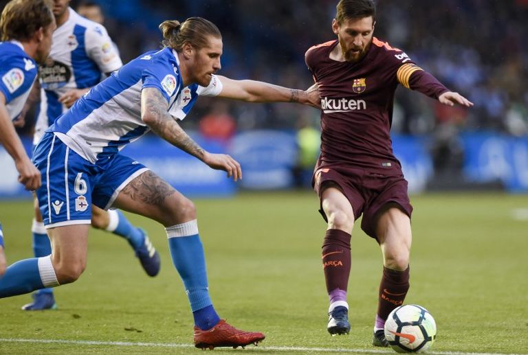 Messi strikes thrice as Barcelona defeat Deportivo 4-2 for La Liga championship