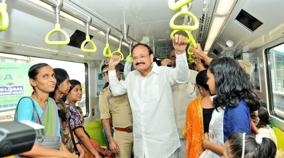 Vice President Naidu rides on Kochi Metro, interacts with passengers