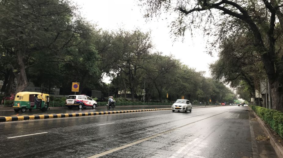 Delhi wakes up to windy and rainy morning