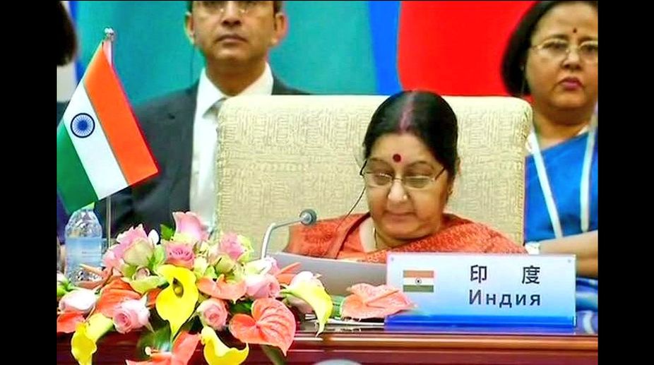 Sushma Swaraj strongly raises issue of terrorism at SCO FMs’ meet in China