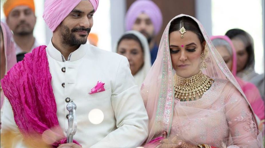 Neha Dhupia gets hitched with Angad Bedi in a hush-hush wedding, see pics