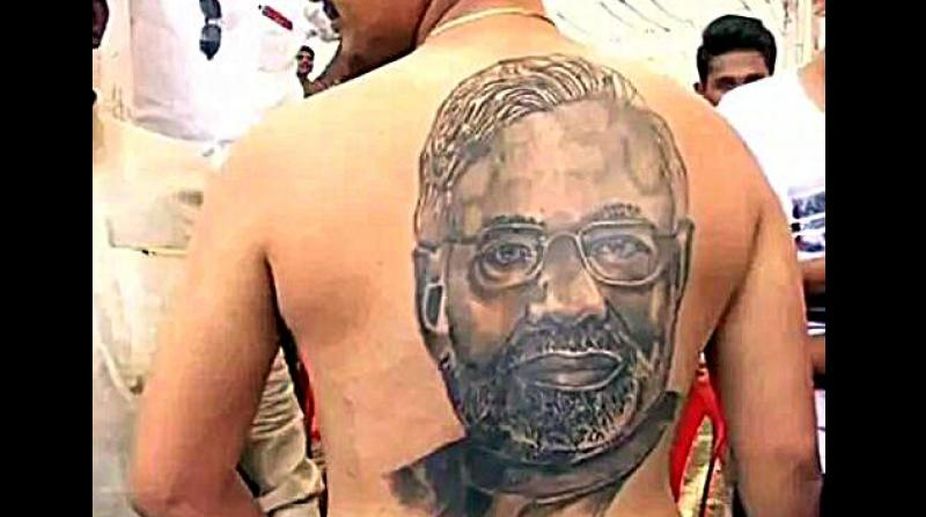 Karnataka man gets PM Modi face tattooed on his back