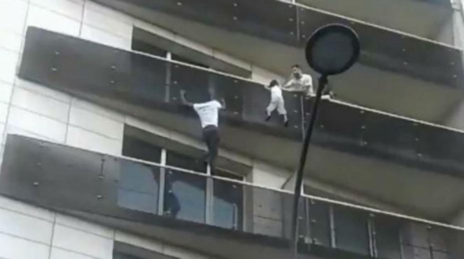 Paris migrant hero who saved dangling child to meet President Macron