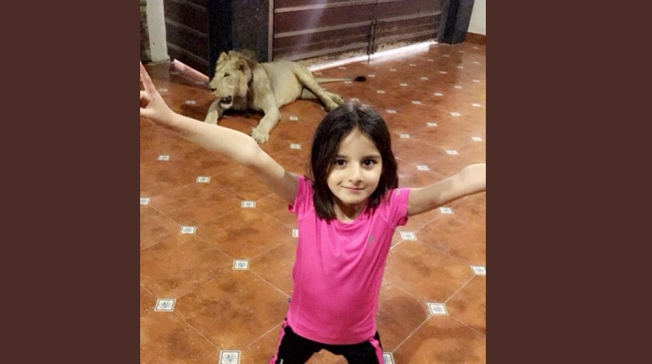 Shahid Afridi trolled for photo showing his daughter striking a pose with lion in background