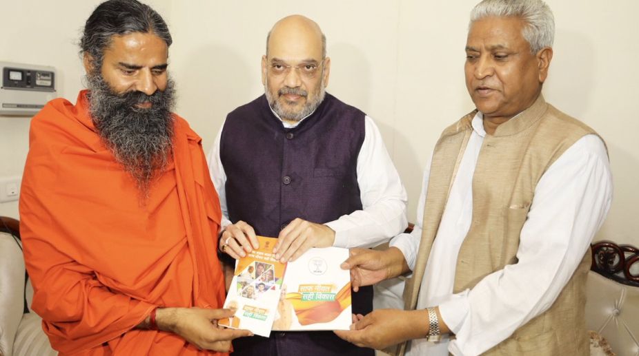 Amit Shah meets Yoga guru Ramdev as part of BJP’s outreach exercise
