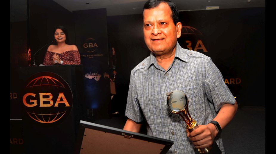 Philanthropist businessman Rakesh Jain after receiving 'Most Dynamic Person of the Year’ award the Global Business Award in New Delhi on Saturday. 