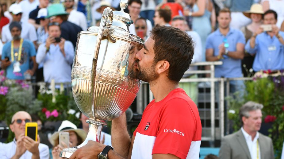King of Queen’s! Cilic saves match point to beat Djokovic for title