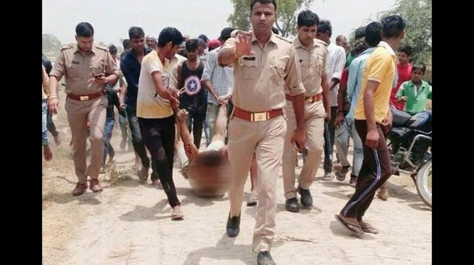 Hapur lynching: Photo showing cops escorting mob dragging victim adds fuel to fire