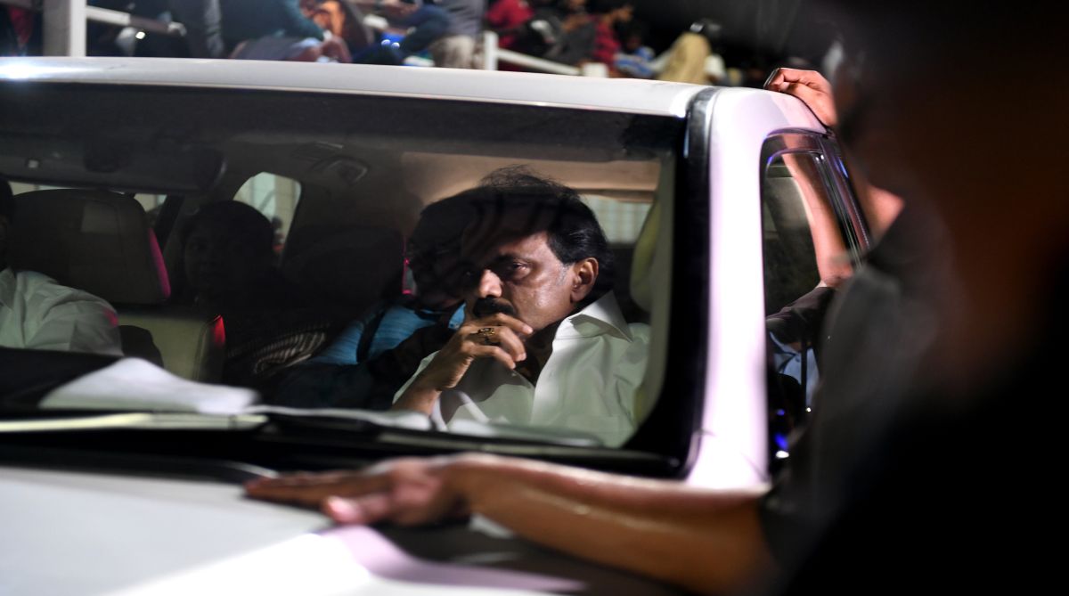DMK party working president gestures as he travel along with an ambulance carrying mortal remains of party president M Karunanidhi from a hospital in Chennai on August 7, 2018. AFP PHOTO / ARUN SANKAR