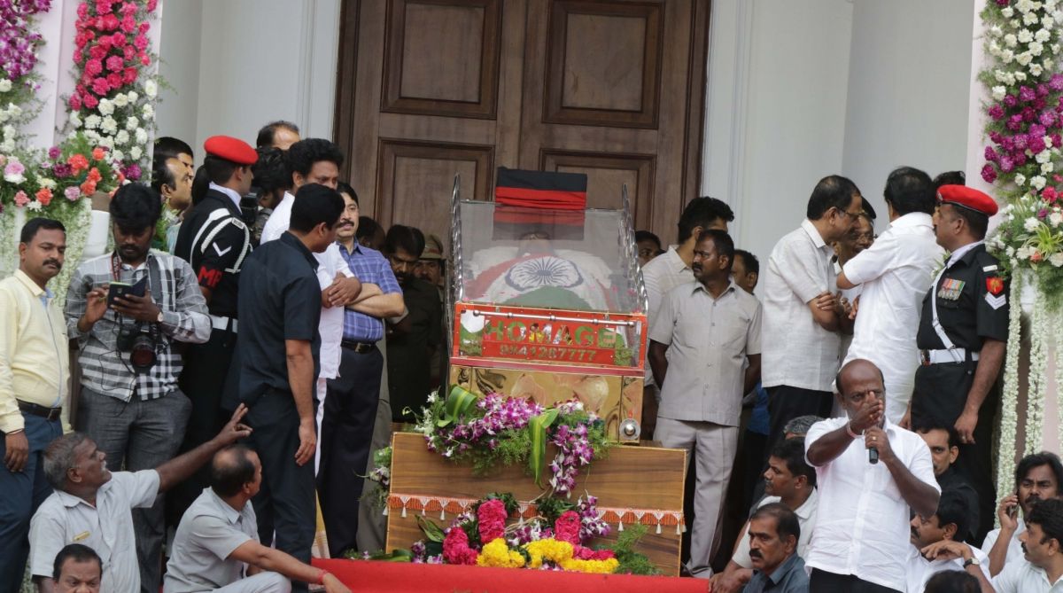 Party supporters pay last respect to DMK patriarch M Karunanidhi at Rajaji Hall in Chennai on August 8, 2018. (Photo: IANS)