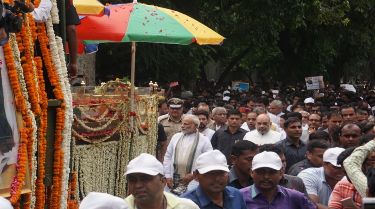 Modi, Shah walk with sea of mourners to bid adieu to Vajpayee