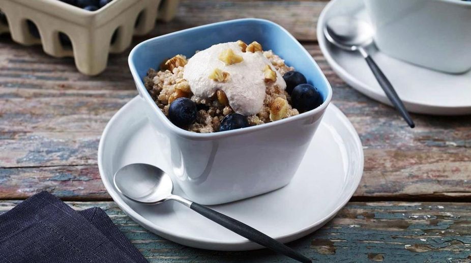 Breakfast Quinoa with Walnut Cream and Blueberries