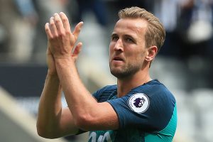 Record-equalling Kane keeps Spurs in title hunt with Cardiff romp