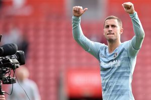 Hazard keeps Chelsea in title hunt at Brighton
