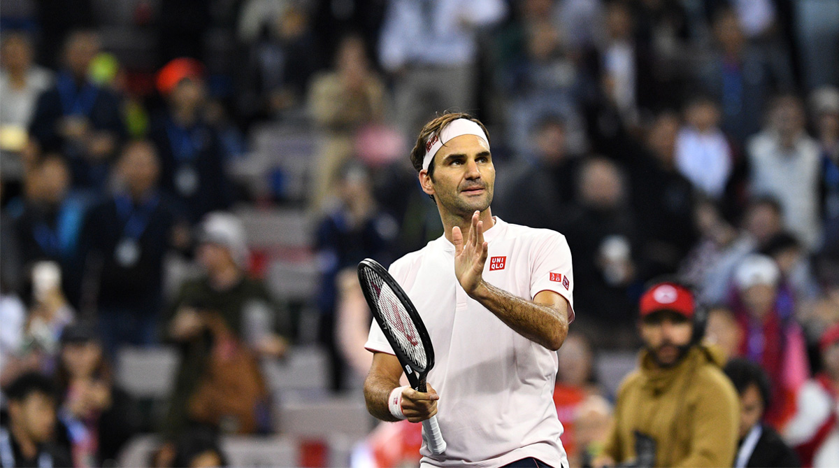 Federer battles into Australian Open third round