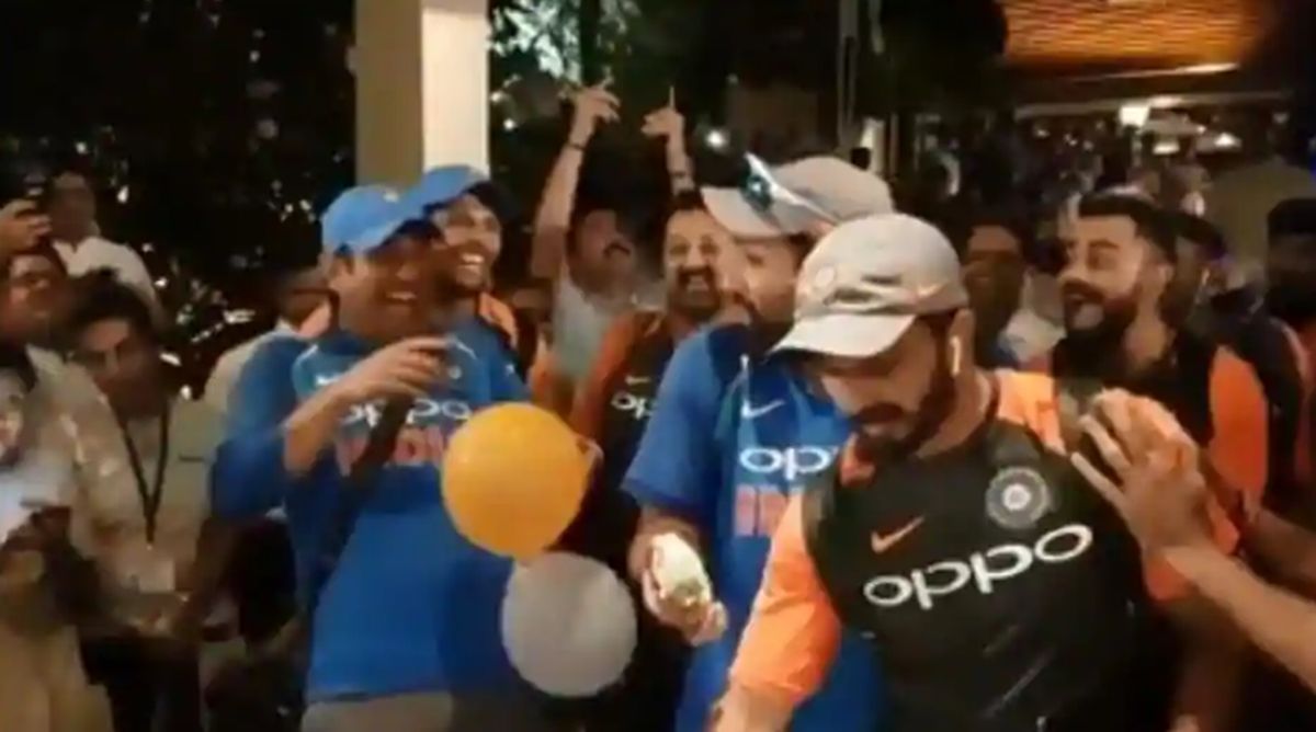 Dhoni pulls a prank on Rohit during post-match celebrations