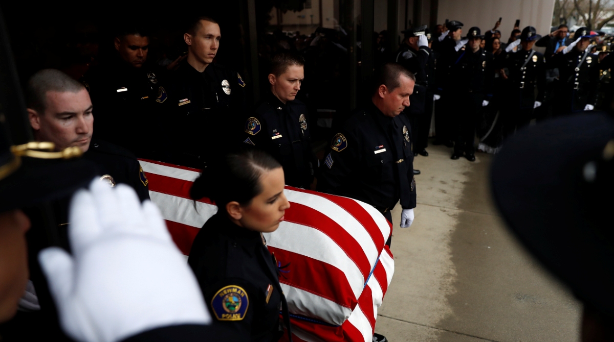 Slain police officer called ‘American hero’ at his funeral