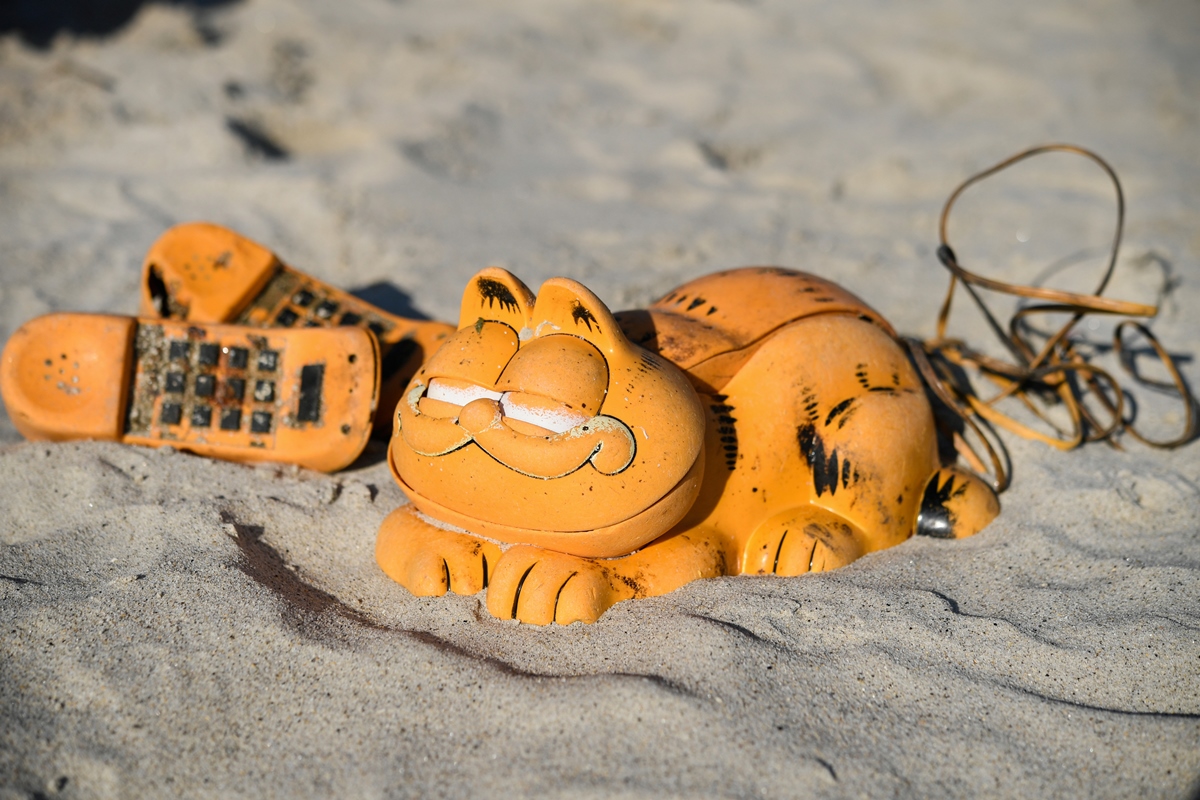 Mystery of Garfield telephones washing up on French beach solved after 30 years