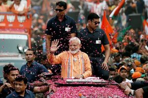 PM Modi holds mega roadshow in Varanasi, performs Ganga aarti