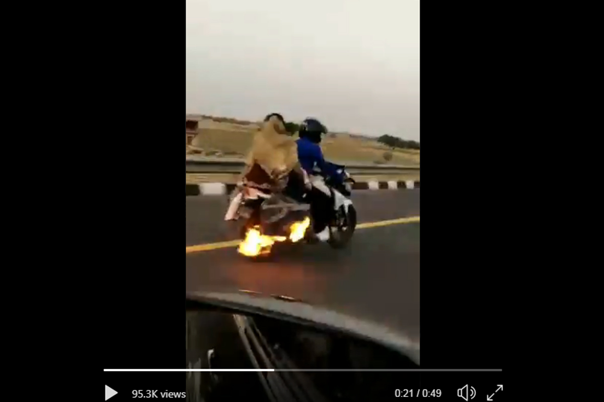 WATCH | UP policemen chase down bike on fire, save three lives
