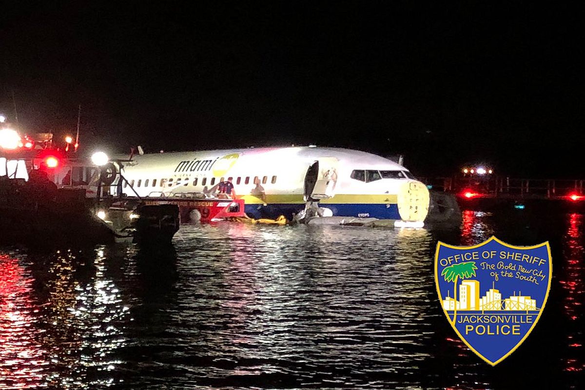 Boeing 737 with 143 on board slides off runway, falls into river in US; 21 injured