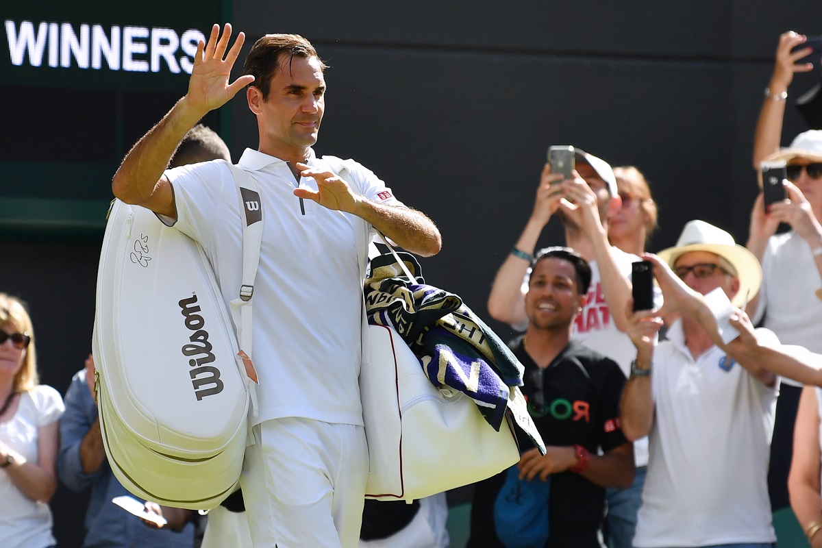 Federer advances to Wimbledon third round