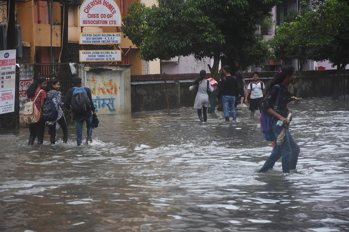 Train services suffer, 400 rescued by boats as rains pound Mumbai