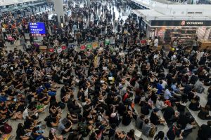 After fresh protests, Hong Kong airport cancels all departures