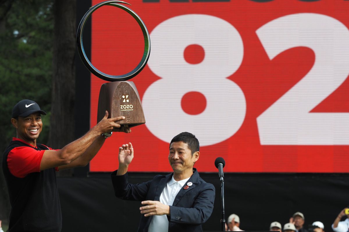 Tiger Woods equals record, has sights on 2020 Olympics