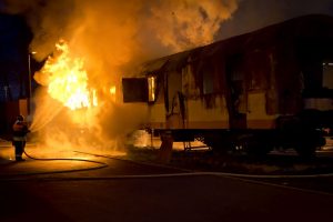 65 dead as fire engulfs express train in Pakistan, several injured