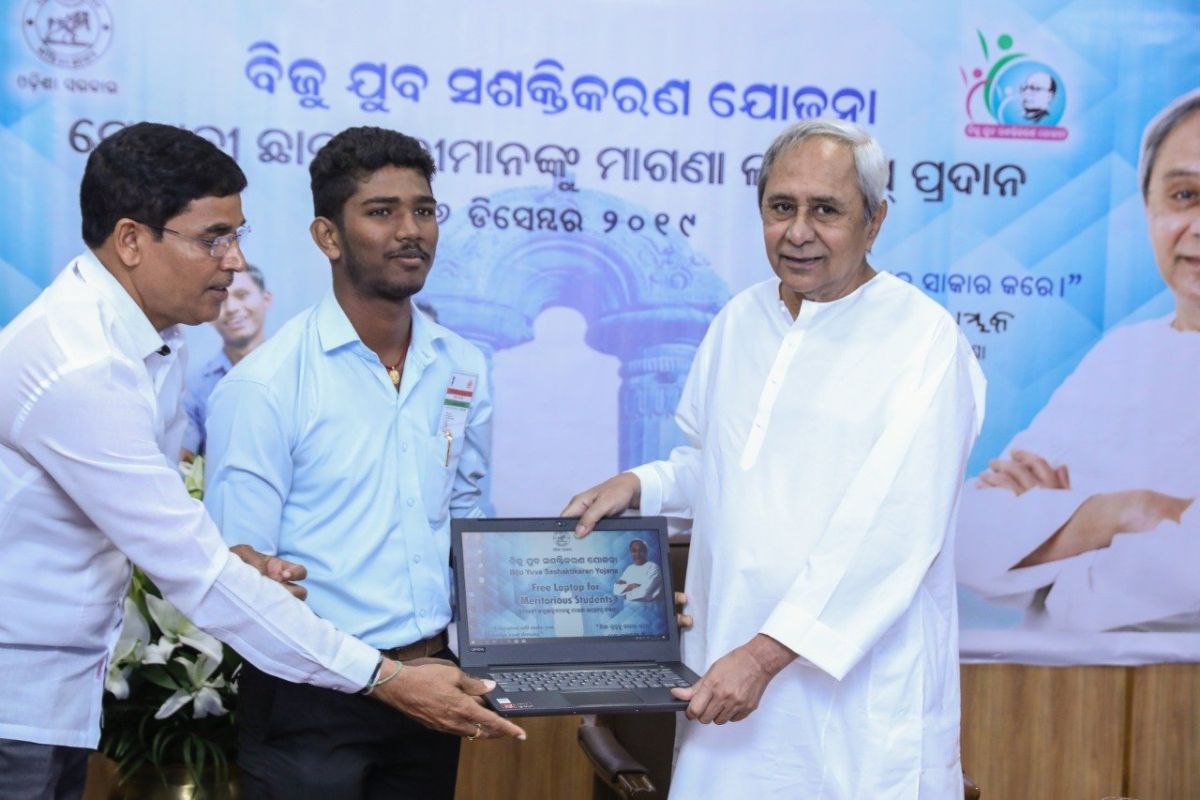 Naveen Patnaik distributes free laptops to meritorious students in Odisha