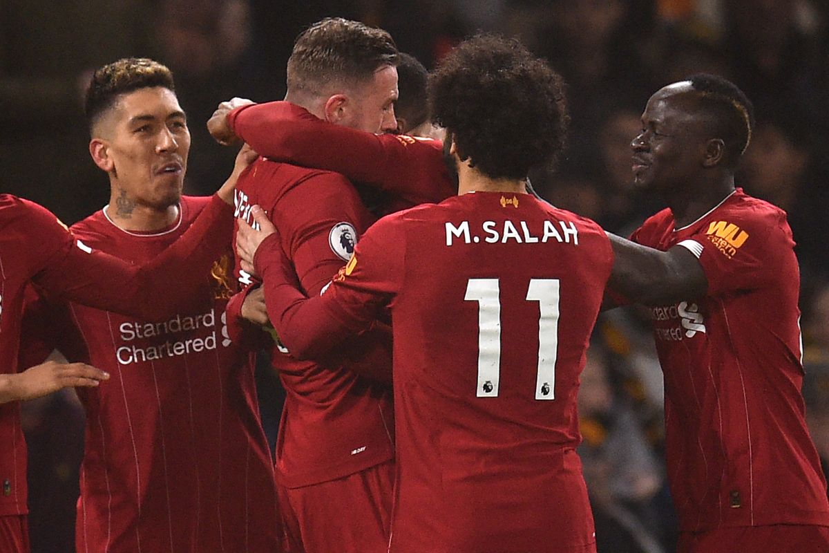 Henderson, Firmino score as Liverpool beat Wolves 2-1 for 14th straight Premier League win