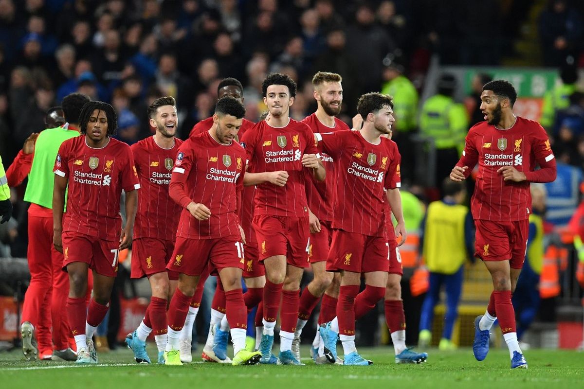 Liverpool kids sink Everton, Lucas rescues Spurs