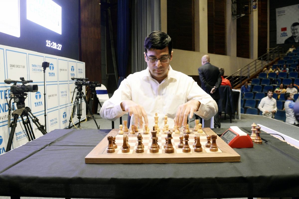 Former World Chess Champion Viswanathan Anand with his wife Aruna and son  Akhil arrives at