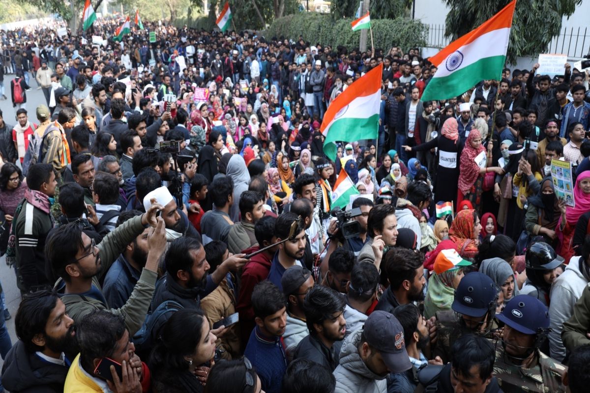 Massive protest erupts near Jamia after man opens fire, police barricades to block march to Rajghat