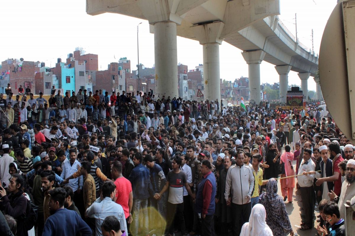 Residents of northeast Delhi form human chain for safety of children going to school
