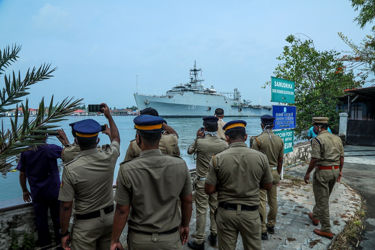 Naval warship INS Jalashwa arrives at Kochi harbour with 698 stranded Indians from Maldives