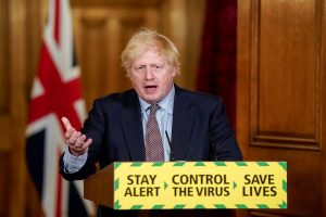Boris Johnson to chair crisis meeting as countries blocked flights to Britain over coronavirus strain