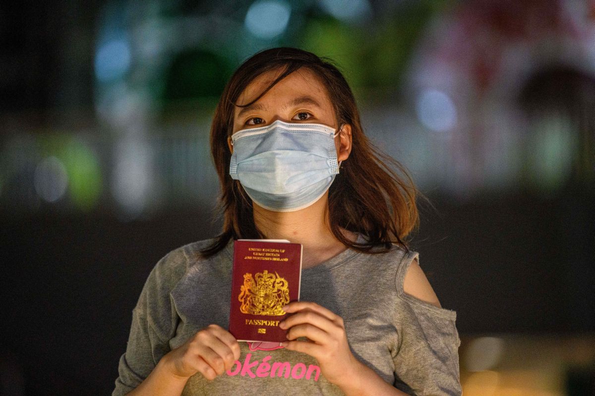 As China plans to impose security law, Hong Kongers rush for limited British passports