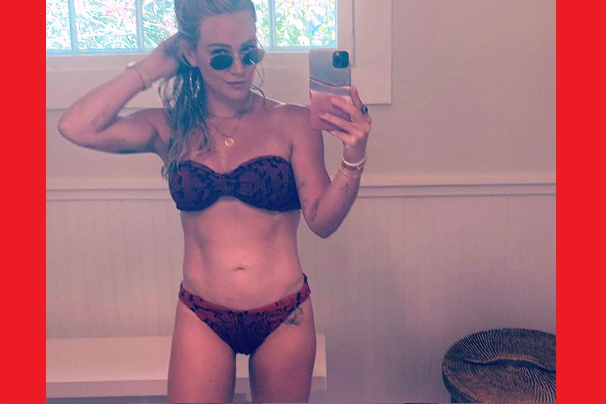 Hilary Duff flaunts toned abs