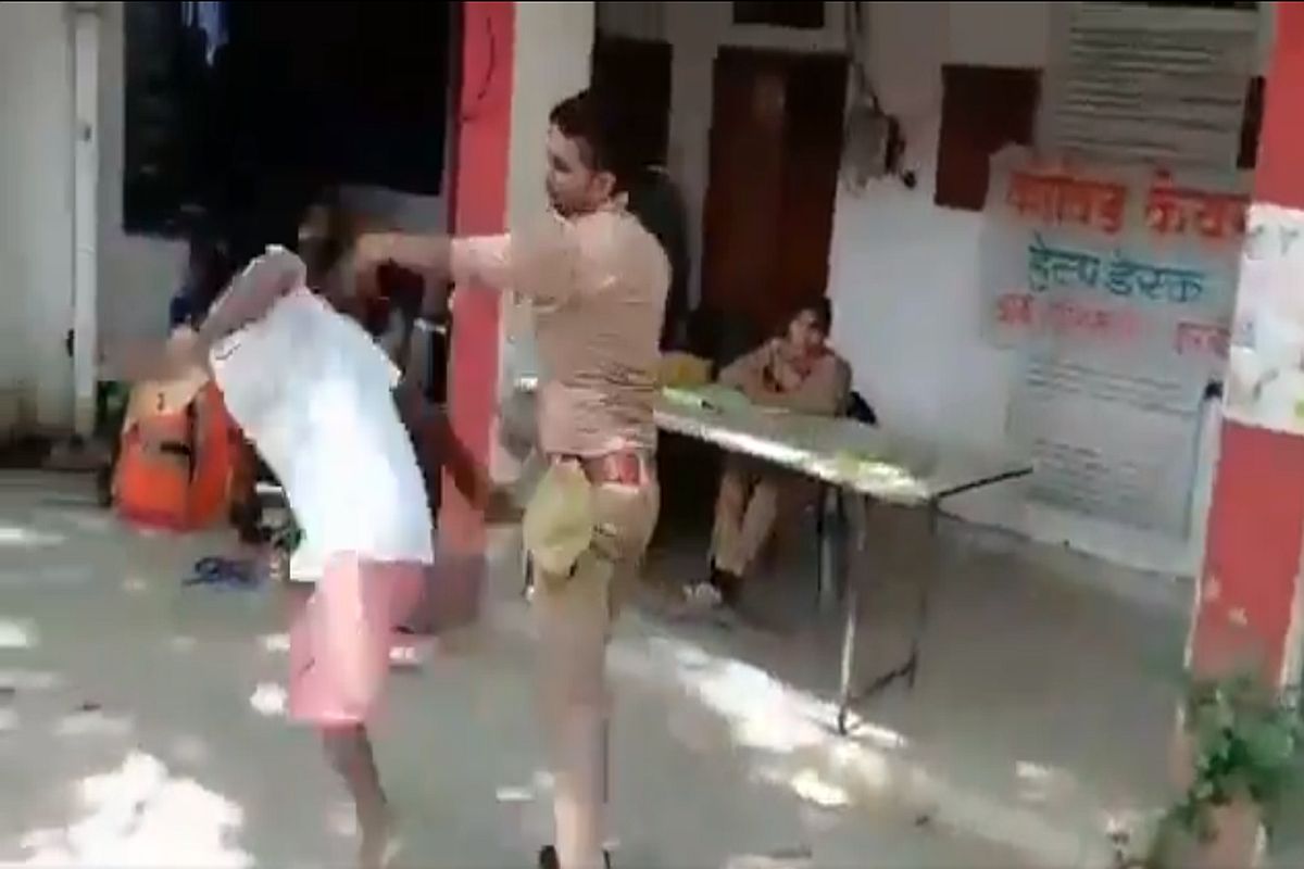 UP cop beats, pushes on ground physically handicapped e-rickshaw driver in Kannauj; suspended