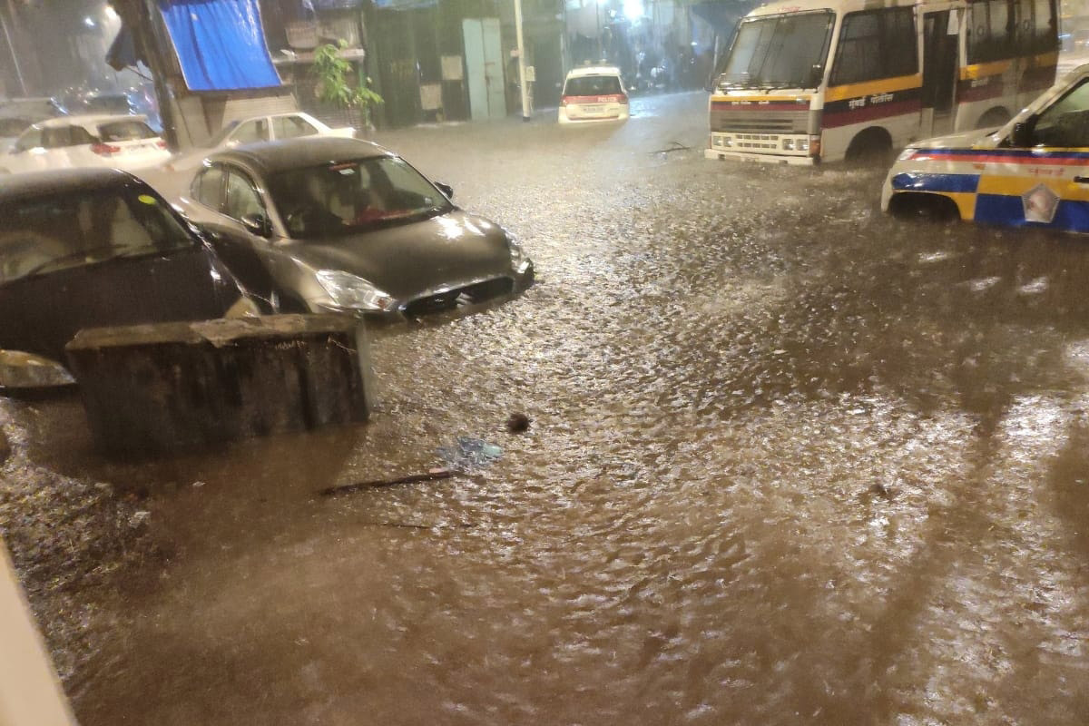 Heavy rains pound Mumbai, local trains hit