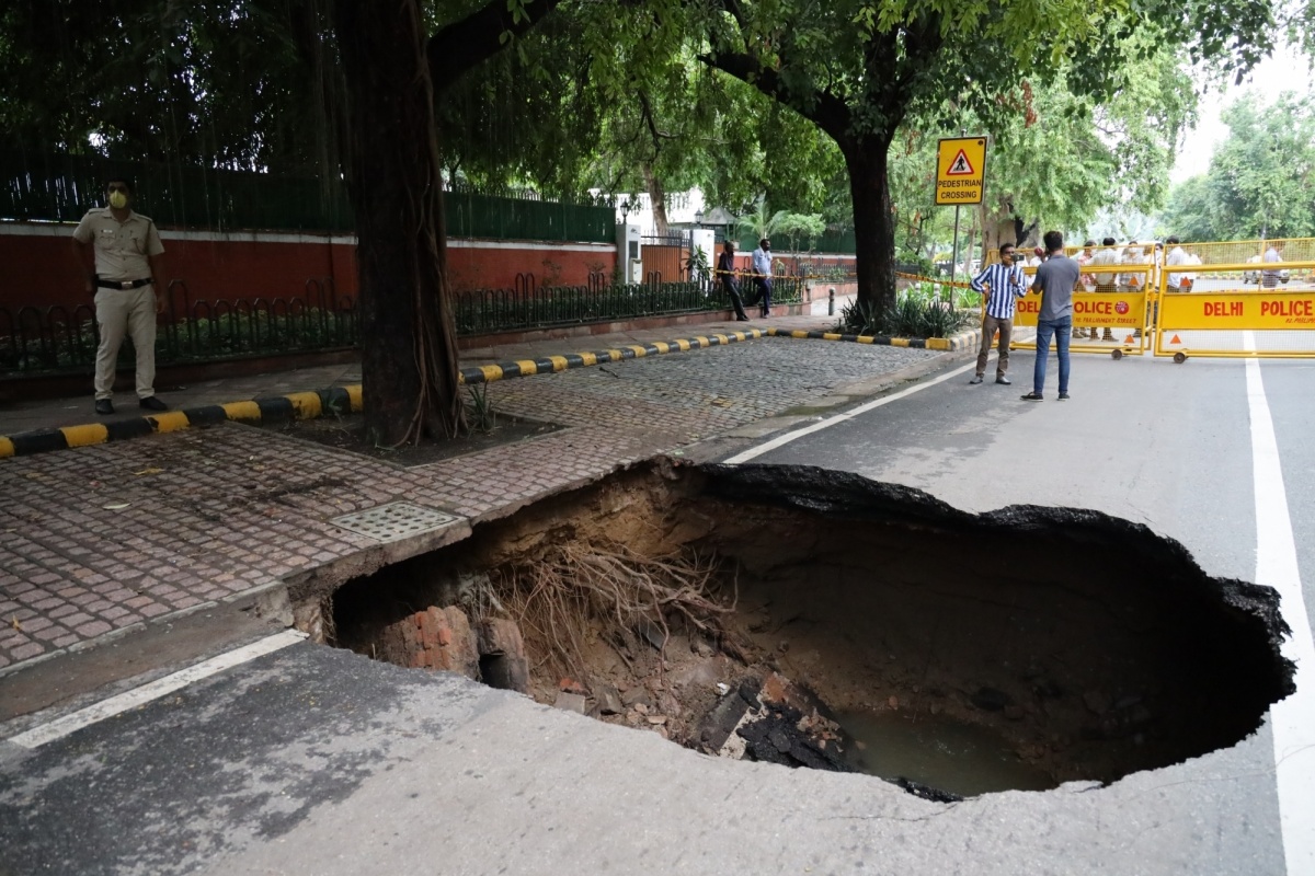 Road caves in, house collapses due to rain in Delhi