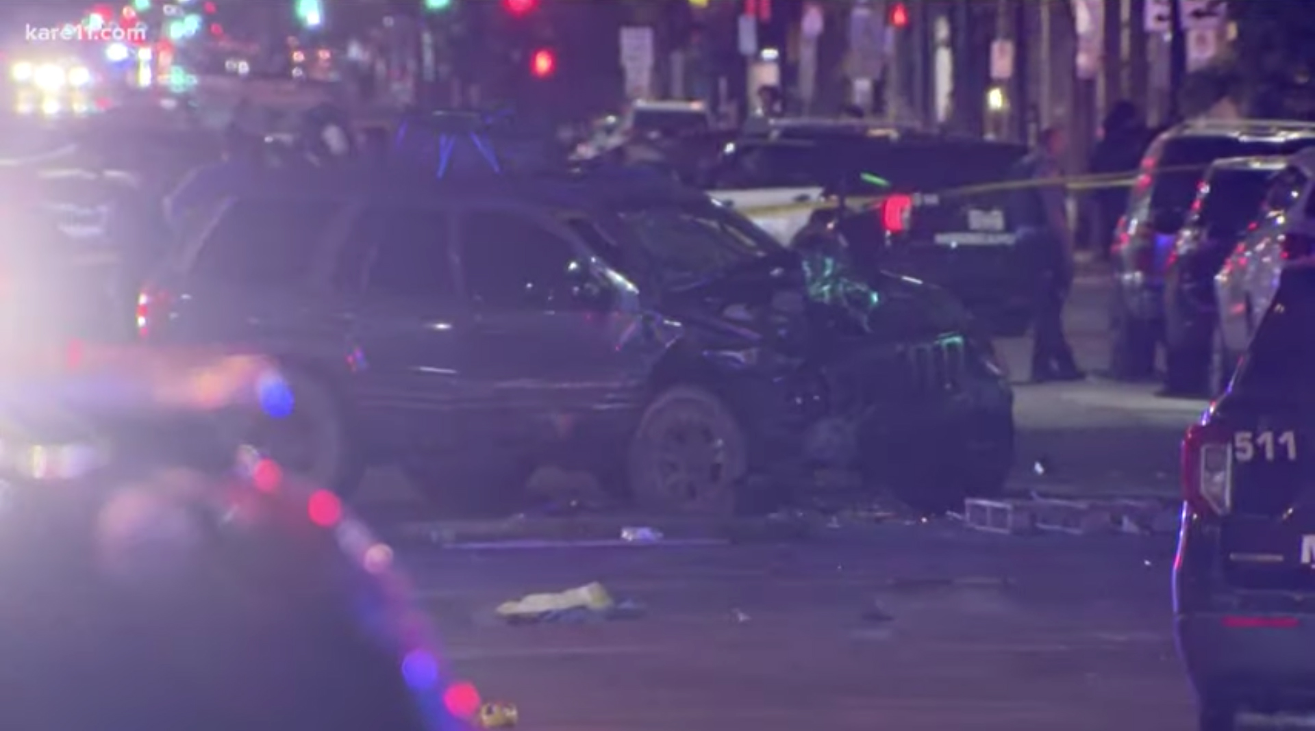 Woman dead as car rams into protesters in Minneapolis